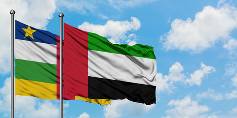 Central African Republic and United Arab Emirates flag waving in the wind against white cloudy blue sky together. Diplomacy concept, international relations.