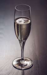 Single generic champagne glass shot in natural light.