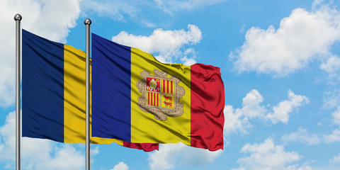 Chad and Andorra flag waving in the wind against white cloudy blue sky together. Diplomacy concept, international relations.