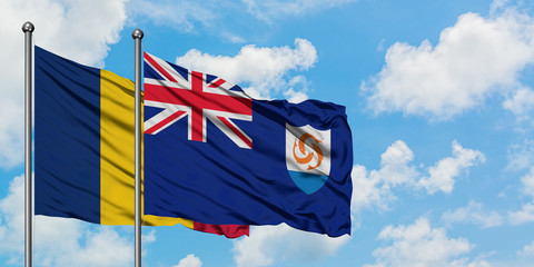 Chad and Anguilla flag waving in the wind against white cloudy blue sky together. Diplomacy concept, international relations.