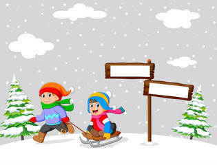 Kids playing a sleigh ride in winter