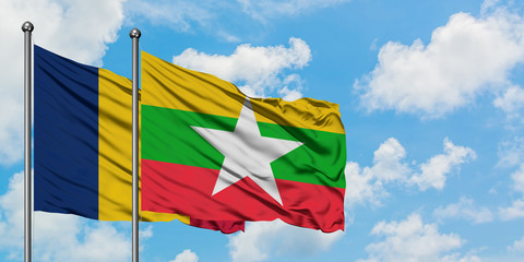 Chad and Myanmar flag waving in the wind against white cloudy blue sky together. Diplomacy concept,...