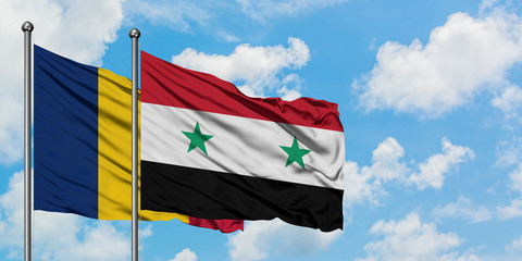 Chad and Syria flag waving in the wind against white cloudy blue sky together. Diplomacy concept,...