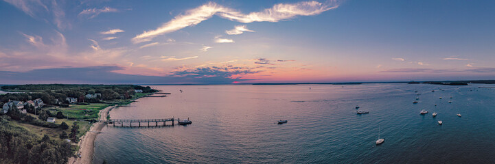Obraz premium panoramic of a coastal area at sunset