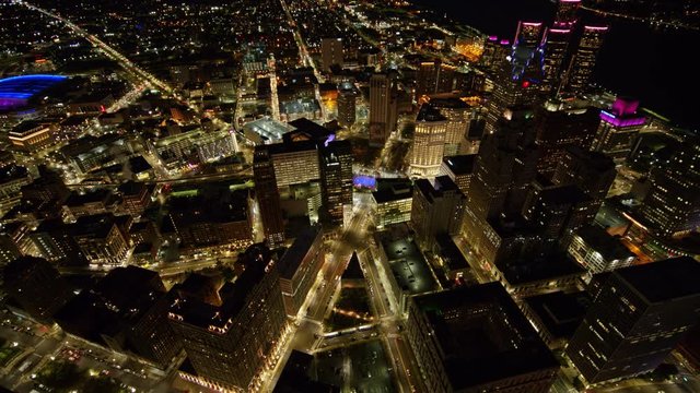 Detroit Michigan Aerial v145 Downtown birdseye cityscape at dusk night moving in descending reverse to skyline view - October 2017