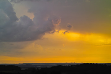 Bad weather front, sun after the storm, thunderstorm with heavy rain and storm has moved from south to north over Upper Bavaria, clouds dissolve and the sun comes out again, Bavaria, Germany