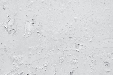 Old gray peeling paint wall