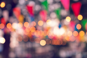 Party bokeh at night market festival,abstract blur image background