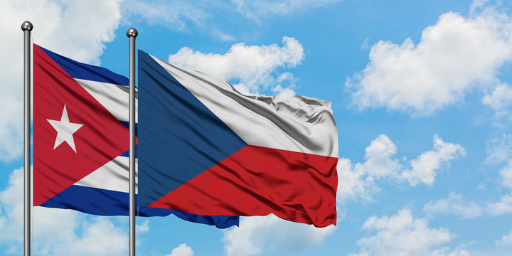 Cuba and Czech Republic flag waving in the wind against white cloudy blue sky together. Diplomacy concept, international relations.