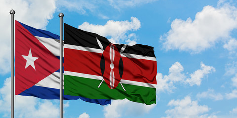 Cuba and Kenya flag waving in the wind against white cloudy blue sky together. Diplomacy concept, international relations.