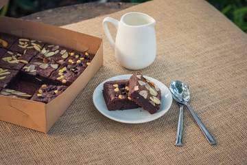 Fudge brownies in white dish on table