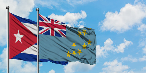 Cuba and Tuvalu flag waving in the wind against white cloudy blue sky together. Diplomacy concept,...