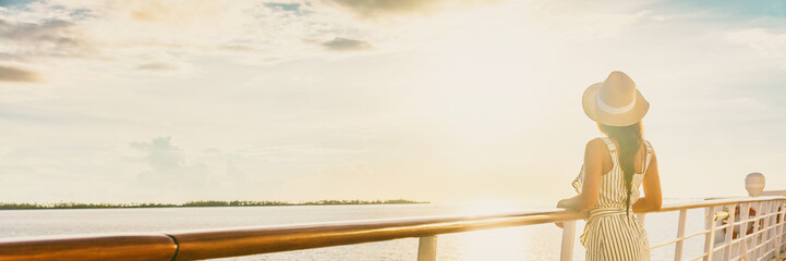 Luxury cruise ship vacation woman elegant tourist woman watching sunset on balcony deck of Europe mediterranean cruising travel destination. Summer vacation cruiseship banner panorama. - obrazy, fototapety, plakaty