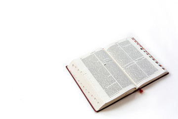 Open holy bible in bahasa Indonesia isolated on white background