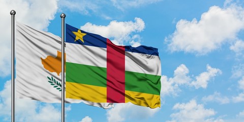 Cyprus and Central African Republic flag waving in the wind against white cloudy blue sky together. Diplomacy concept, international relations.