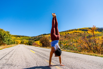 Woman Doing Handstands and Looking over the Black Canyon of the Gunnison