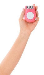 Fototapeta premium Female hand with modern epilator on white background