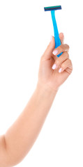 Female hand with razor on white background