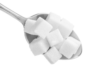 Spoon with sugar on white background