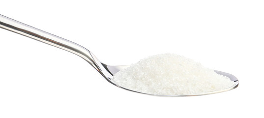 Spoon with sugar on white background