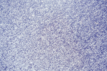 Granite wall for background. Color scampi and Violet white hue. Small parts.
