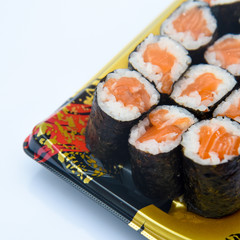 Sushi Roll with salmon on the white background .Food abstract background