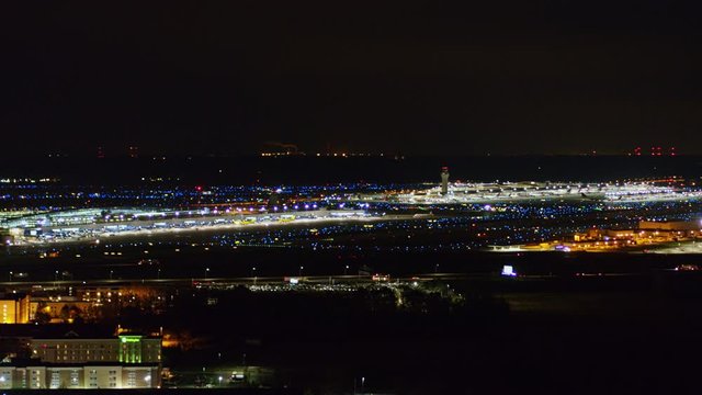Detroit Michigan Aerial v167 Descending nighttime view of airport with freeway and motel in foreground - October 2017
