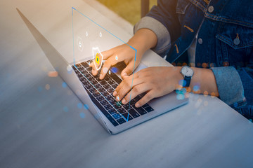 Person using a laptop computer with technology cybersecurity and privacy concept. protection and safe data for global network security.