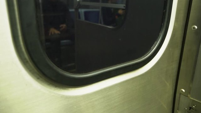 Static shot of reflection in Chicago subway window