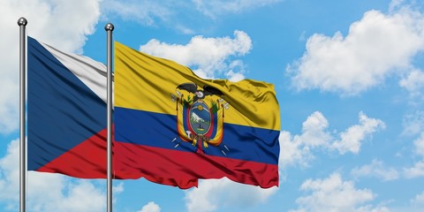Czech Republic and Ecuador flag waving in the wind against white cloudy blue sky together. Diplomacy concept, international relations.