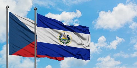 Czech Republic and El Salvador flag waving in the wind against white cloudy blue sky together. Diplomacy concept, international relations.