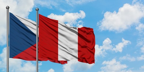 Czech Republic and Peru flag waving in the wind against white cloudy blue sky together. Diplomacy concept, international relations.