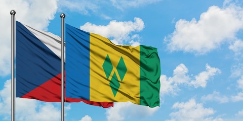 Czech Republic and Saint Vincent And The Grenadines flag waving in the wind against white cloudy...