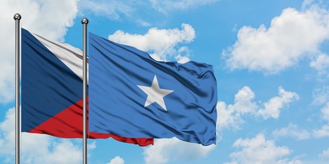 Czech Republic and Somalia flag waving in the wind against white cloudy blue sky together. Diplomacy concept, international relations.