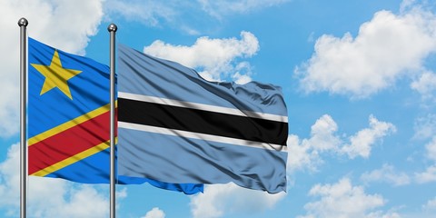 Congo and Botswana flag waving in the wind against white cloudy blue sky together. Diplomacy concept, international relations.
