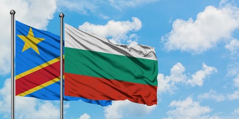 Congo and Bulgaria flag waving in the wind against white cloudy blue sky together. Diplomacy concept, international relations.