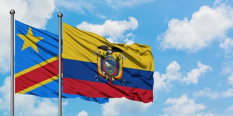 Congo and Ecuador flag waving in the wind against white cloudy blue sky together. Diplomacy concept, international relations.