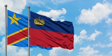 Congo and Liechtenstein flag waving in the wind against white cloudy blue sky together. Diplomacy concept, international relations.