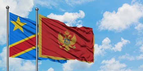 Congo and Montenegro flag waving in the wind against white cloudy blue sky together. Diplomacy concept, international relations.