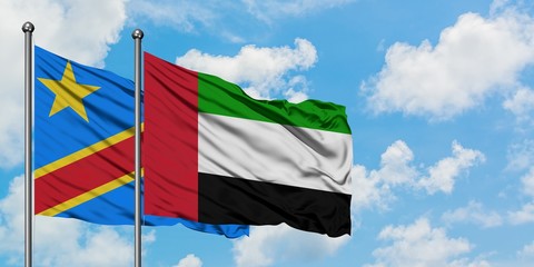 Congo and United Arab Emirates flag waving in the wind against white cloudy blue sky together. Diplomacy concept, international relations.
