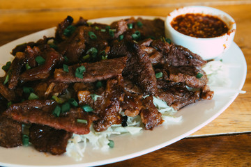 Grilled meat cow or beef of Thai food style for eating with Somtum.