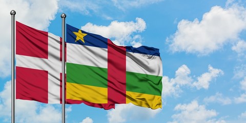 Denmark and Central African Republic flag waving in the wind against white cloudy blue sky together. Diplomacy concept, international relations.