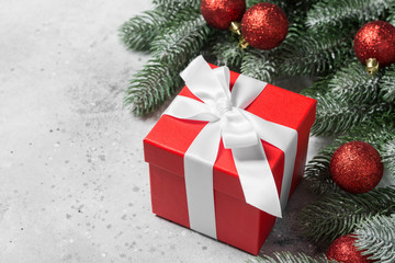 Red color gift box on Christmas background