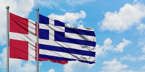 Denmark and Greece flag waving in the wind against white cloudy blue sky together. Diplomacy concept, international relations.