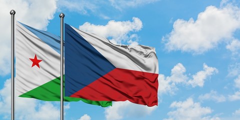 Djibouti and Czech Republic flag waving in the wind against white cloudy blue sky together. Diplomacy concept, international relations.