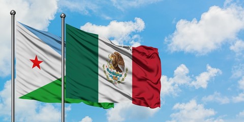 Djibouti and Mexico flag waving in the wind against white cloudy blue sky together. Diplomacy concept, international relations.