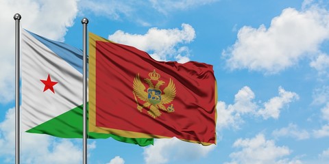 Djibouti and Montenegro flag waving in the wind against white cloudy blue sky together. Diplomacy concept, international relations.