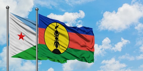 Djibouti and New Caledonia flag waving in the wind against white cloudy blue sky together. Diplomacy concept, international relations.