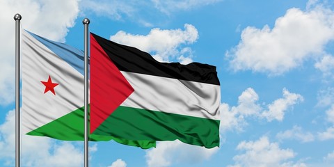 Djibouti and Palestine flag waving in the wind against white cloudy blue sky together. Diplomacy concept, international relations.