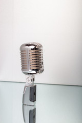 Fototapeta premium Retro microphone isolated on white background. Music and karaoke.